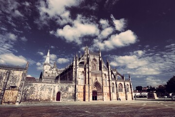 Batalha Monastery in Portugal. Retro filtered color style.