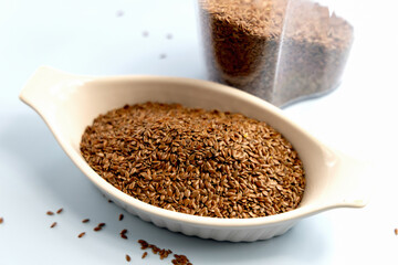 Healthy uncooked raw flax seeds in a bowl. High quality photo
