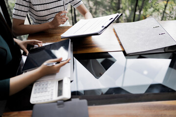 Accountant assessing office numbers for accurate valuation documents