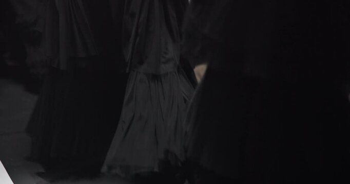 Fashion, stage and designer with legs of models on runway for couture, walking and aesthetic. Catwalk, event and collection with people at expo showcase for audience, clothing industry and production