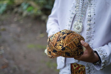 Indonesian Traditional Headwear Batik Cap and Cultural Significance