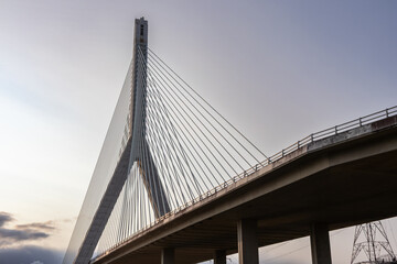 Flintshire Bridge stands prominently in the soft light of early morning, with its cables and concrete structure leading into the distance