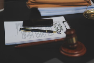 female business woman lawyers working at the law firms. Judge gavel with scales of justice. Legal law, lawyer, documents, advice and justice concept.