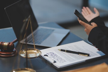 female business woman lawyers working at the law firms. Judge gavel with scales of justice. Legal law, lawyer, documents, advice and justice concept.