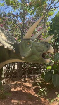 Gournes, Heraklion, Crete, Greece. June 2, 2024. Dinosauria park. Video of a moving dinosaur in the dino park