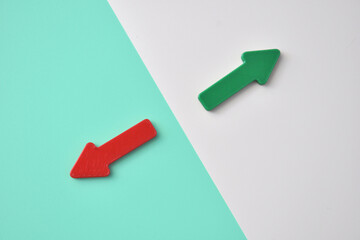 The two arrows point in different directions. It is a symbol of different approaches to life. Different paths