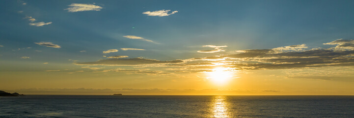 Florianópolis, Campeche beach during sunrise. Brazil. Rio Tavares neighborhood in web banner during sunrise. Aerial view in web banner.