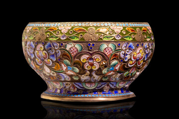 Sugar bowl with arabic ornament on black background