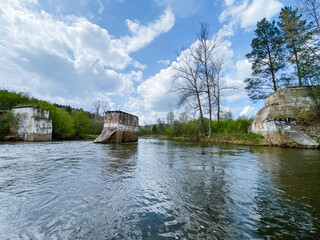 On a sunny day, there is a vast and expansive body of water that is beautifully surrounded by lush...
