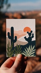 Sunset Oasis: Papercut Cactus Silhouettes in Handcrafted Desert Card Symbolizing Growth in Barren Places
