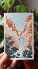 Serene Waterfall and Papercutting Craft in Harmony - Graceful Hand Cutting Artwork Against Peach Cliffs and Blue Sky