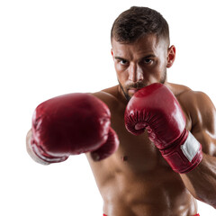A focused boxer with red gloves in a fighting stance against a black background ready to strike hard