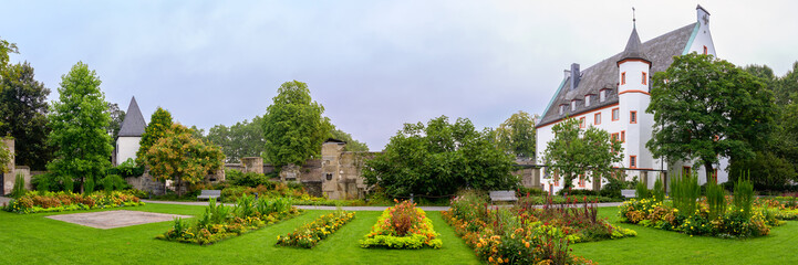 Colorful blooms decorate a garden near Dreilaender Eck, inviting visitors to explore the beauty - Koblenz, Germany.