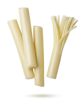 Cheese string cheese sticks flying on a white background. Isolated