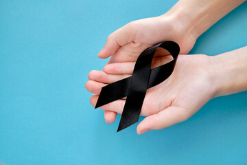 Black symbolic ribbon -  Melanoma problem