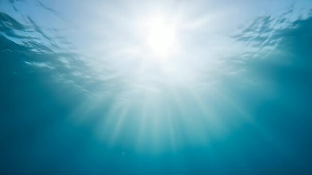 Underwater Sun Rays Penetrating Ocean Depth Creating Beautiful Light Beams in Crystal Clear Blue Water for Marine Exploration