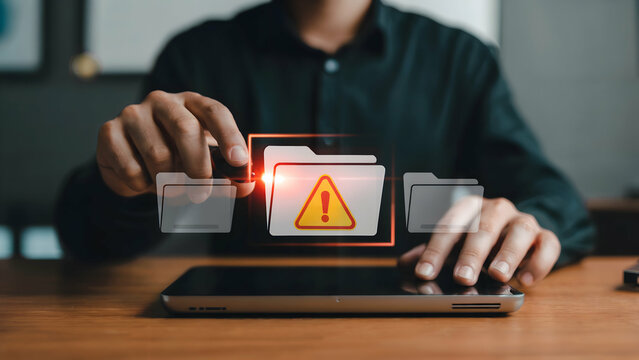 A businessman uses a digital tablet to manage files experiencing a critical error warning a system failure requiring urgent attention indicating data loss or corruption needs immediate action.