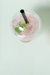 Plastic glass with bubble tea and ice. Trendy summer drink