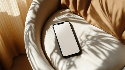 Smartphone on Cream Couch with Shadows in Cozy Sunlit Room