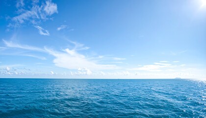 Fototapeta premium Ocean Horizon with Blue Sky, and Clouds.