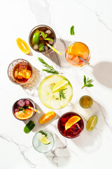 Alcohol cocktail drinks at white background.