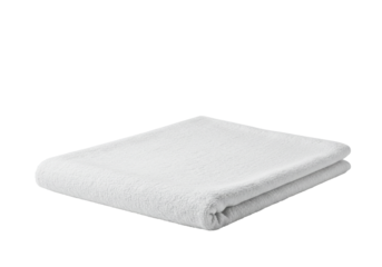Soft, folded white towel on a clean surface, ideal for spa or bathroom settings