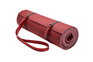 Red yoga mat partially unrolled showing thickness with matching carrying strap, isolated on a transparent background