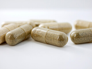 Herbal medicine capsule isolated on white background, Close-up of Herbal medicine capsule