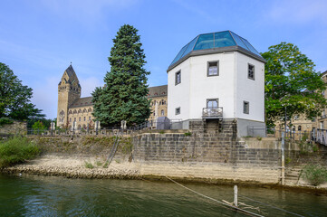 Pegelhaus serves as a water level gauge and restaurant on the Rhine in Koblenz