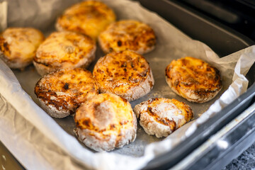 Cheesecakes cooked in an electric grill.