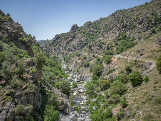 Camping Caravan driving through Canyon de la Ruda road Corsica down the pass monte Cino