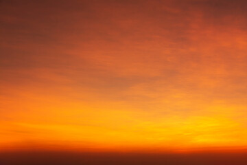 Golden hour sky, orange sky looks warm in the evening.