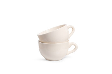 Two white cups isolated on a white background with copy space