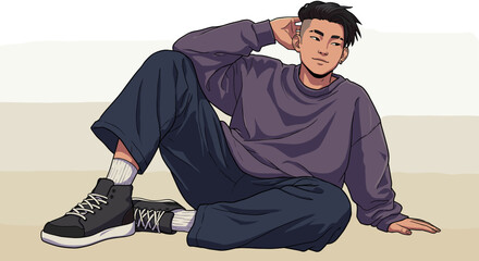 Young man sitting casually on the floor in comfortable clothing  