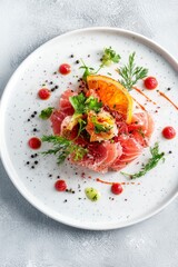 Gourmet Plated Dish with Fresh Fish, Vegetables and Citrus Accents