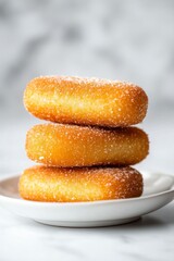 Soft and Sweet Golden Dessert Treat Stacked on a White Plate