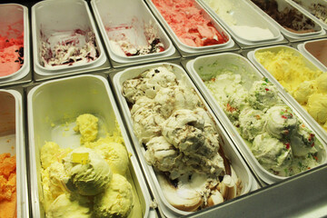 Weight ice cream in the freezer. Sale of summer dessert