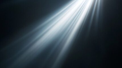 Bright rays of light stream across a dark background, simulating a dramatic sunbeam or lens flare effect