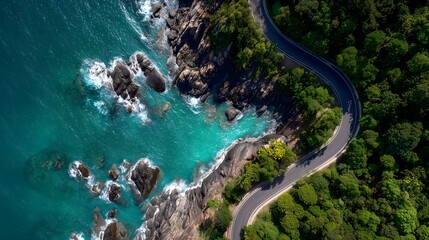 Aerial View of Coastal Road with Ocean and Forest