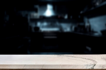 Empty marble top table with blurred kitchen interior Background. for product display