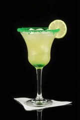 Emerald Elixir: A refreshing cocktail sparkles in a tall, elegant glass, adorned with a sugared rim and a zesty lime slice, a perfect indulgence.