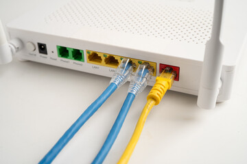 Ethernet cable with wireless router connect to internet service provider network.