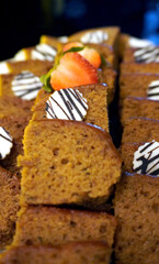 Indulge your sweet tooth! Decadent cake with rich chocolate topping. Perfect for dessert lovers.