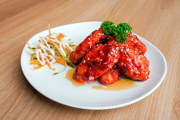 Delicious fried chicken wings with rich BBQ sauce. Perfect for comfort food, game day, or restaurant promotions
