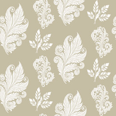 Luxury seamless pattern with scattered, ornate white baroque leaves on a beige background. An elegant and classic design for timeless decor, fabric, and gift wrap.