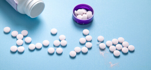 Vitamins for hair, skin and nails on the blue background. Health