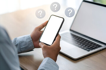 Person using smartphone and laptop seeking answers online finding solutions troubleshooting problems technology support questions help desk