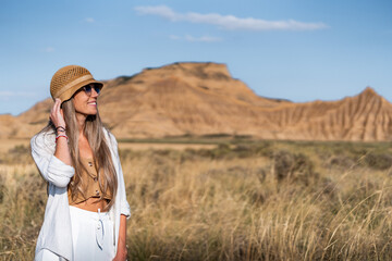 Tourist enjoying scenic view of bardenas reales desert landscape