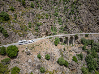 Camping Caravan driving through Canyon de la Ruda road Corsica down the pass monte Cino