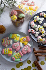 Christmas marshmallows. Winter candy. Sweet food for ugly sweater party in december
